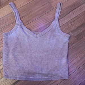 xs tan tank top / soft v neck line / never worn